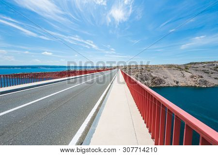 Red Bridge Over The Canyon In Croatia. View From The Bridge To The Canyon In The Krka National Park.