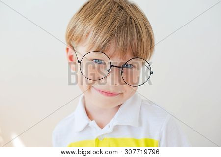 Handsome Teen Boy Wears Glasses. Poor Vision And Medicine Concept