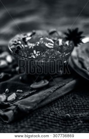 Famous Mango Preservation I.e. Murba Or Murabba In A Glass Bowl On Jute Bags Surface Along With Dry