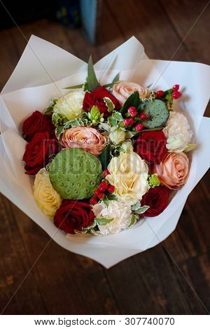 Bouquet Of Flowers On A Leg In The Interior Of The Restaurant For A Celebration Shop Floristry Or We