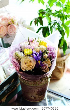 Bouquet Of Flowers On A Leg In The Interior Of The Restaurant For A Celebration Shop Floristry Or We