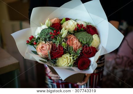 Bouquet Of Flowers On A Leg In The Interior Of The Restaurant For A Celebration Shop Floristry Or We