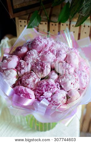 Bouquet Of Flowers On A Leg In The Interior Of The Restaurant For A Celebration Shop Floristry Or We