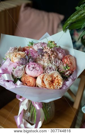Bouquet Of Flowers On A Leg In The Interior Of The Restaurant For A Celebration Shop Floristry Or We
