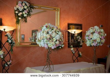 Bouquet Of Flowers On A Leg In The Interior Of The Restaurant For A Celebration Shop Floristry Or We