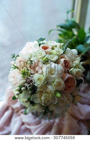 Bouquet Of Flowers On A Leg In The Interior Of The Restaurant For A Celebration Shop Floristry Or We