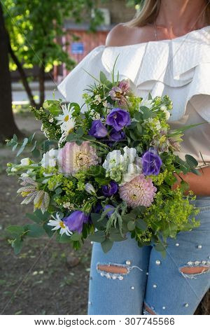 Bouquet Of Flowers On A Leg In The Interior Of The Restaurant For A Celebration Shop Floristry Or We