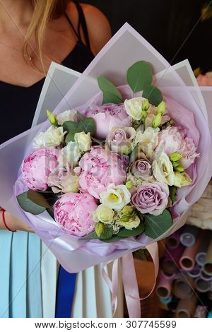 Bouquet Of Flowers On A Leg In The Interior Of The Restaurant For A Celebration Shop Floristry Or We