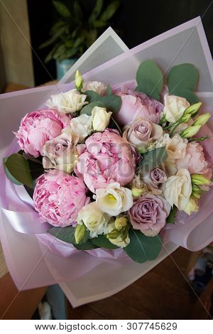 Bouquet Of Flowers On A Leg In The Interior Of The Restaurant For A Celebration Shop Floristry Or We
