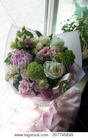 Bouquet Of Flowers On A Leg In The Interior Of The Restaurant For A Celebration Shop Floristry Or We