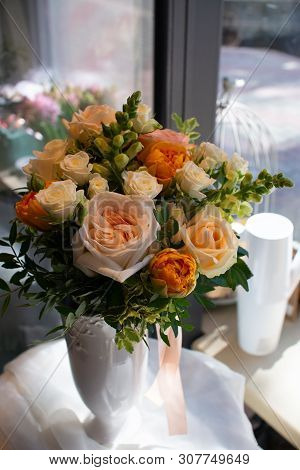 Bouquet Of Flowers On A Leg In The Interior Of The Restaurant For A Celebration Shop Floristry Or We