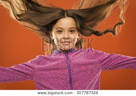 Kid Girl Long Healthy Shiny Hair. Little Girl Grow Long Hair. Teaching Child Healthy Hair Care Habit