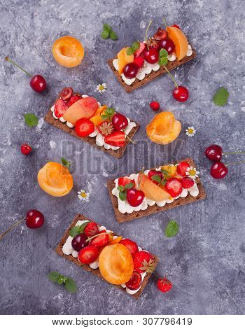 Crisp Bread With Creme Cheese, Fruit And Berries