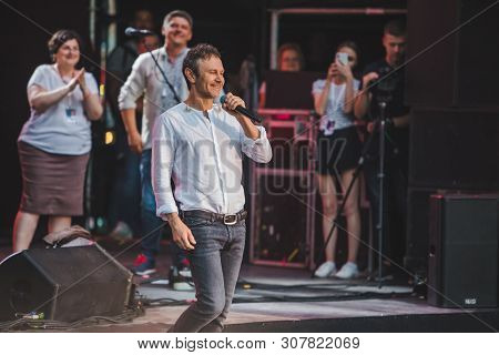 Lviv, Ukraine - June 18, 2019: Vakarchuk At Stage Talking In Microphone. Political