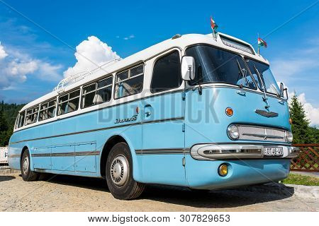 Cozmeni, Romania- 23 June 2019: Side View Of A  Retro Hungarian Ikarus 55 , Fabricated In  1955 .