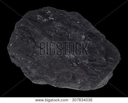 A Piece Of Coal Before Exemptly Black Background.