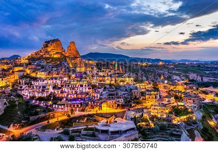 View Of Uchisar With The Castle At Sunset. Cappadocia, Turkey