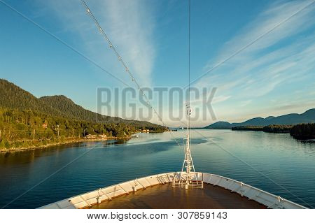 Pointed Bow Of Cruise Ship , Southbound On Ocean Channel, Alaska Inside Passage, In Warm Afternoon S