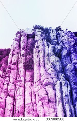 An Abstract Color Transition Of Pink To Purple On The Cliff Of Books Within Mount Song Scenic Area I