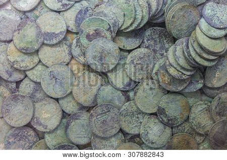 Cartagena, Spain - September 14th, 2018: Recovered Silver Spanish Coins Recovered From Sunken Ship. 