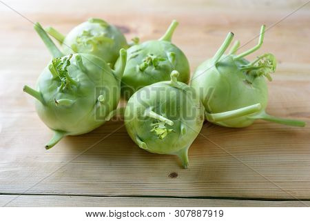 Fresh Green Kohlrabi On Wood Background. Kohlrabi Or German Turnip Or Turnip Cabbage Is A Biennial V