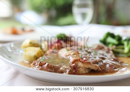 Saltimbocca Pork Steak On A Place In Closeup