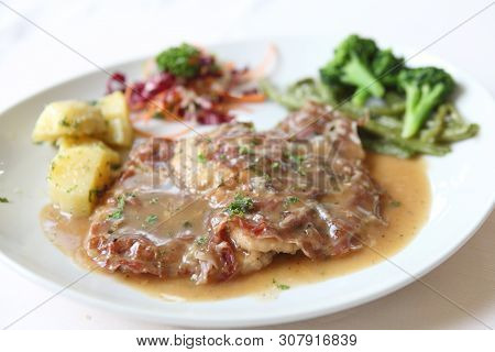 Saltimbocca Pork Steak On A Place In Closeup