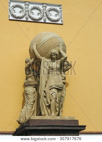 Saint-petersburg, Russia - April 30, 2019: Caryatid Holding The Globe On The Facade Of The Admiralty
