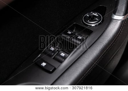 Novosibirsk, Russia - June 18, 2019:  Hyundai I40, Close-up Of The Side Door Buttons: Window Adjustm