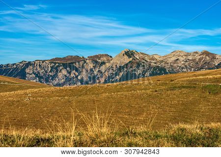 Italian Alps And The Plateau Of Lessinia With The Carega Mountain, Called The Small Dolomites. Regio