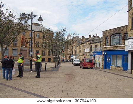 Bradford, West Yorkshire, United Kingdom - 19 June 2019: Police Community Support Officers Talk To P