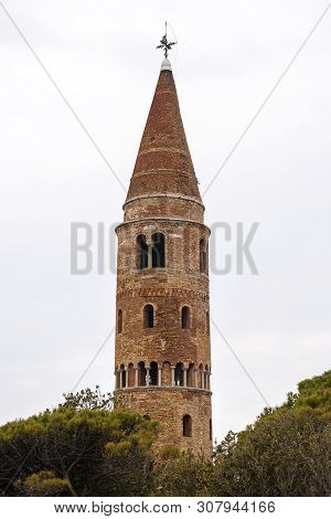 Medieval Bell Tower (1038) Of The Cathedral Of Caorle (santo Stefano Protomartire). Venice Province,