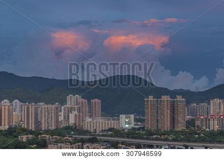 Dynamic Cloud Over Resiential District Of Hong Kong At Dusk