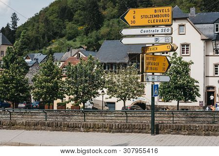 Vianden, Luxembourg - May 18, 2019: Directional Signs On A Street In Vianden, Town In Luxembourgs Ar