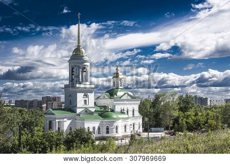 Russia. Yekaterinburg. Orthodox Church Against The Blue Sky .