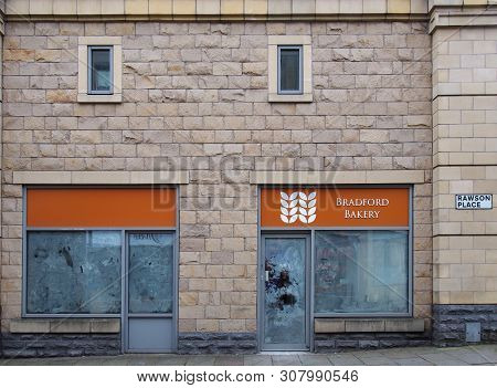 Bradford, West Yorkshire, United Kingdom - 19 June 2019: A Closed Bakery And Empty Shop In The Rawso