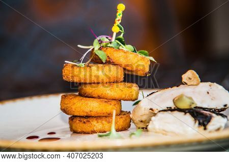 Potato Ducats With Chicken Meat.the Food In The Restaurant. Food Styling And Restaurant Meal Serving