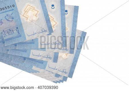 1 Malaysian Ringgit Bills Lies In Small Bunch Or Pack Isolated On White. Mockup With Copy Space. Bus