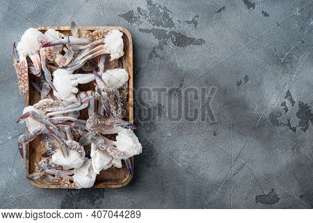Frozen Raw Blue Swimming Crab Meat Set, On Wooden Tray, On Gray Background, Top View Flat Lay , With