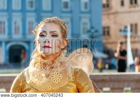 Timisoara, Romania - March 31, 2017: Woman In A Masquerade Costume Dress Posing As A Living Statue A