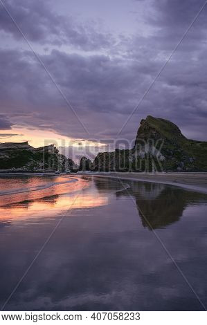 Sunset At The Bach In Castle Rock. New Zealand. Vertical Photography.