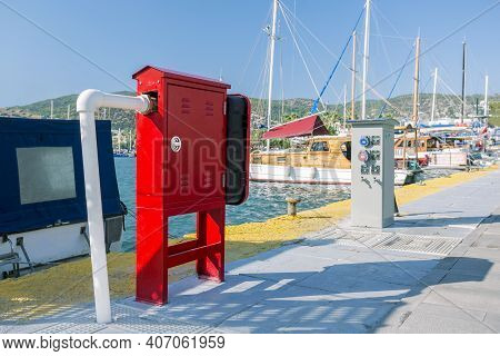 Red Safety Hydrant Station At Marina. Fire Safety Concept.