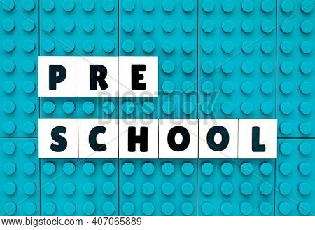 Pre-school Sign Text Build With Interlocking Plastic White And Sky Blue Bricks