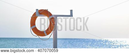 Orange Lifeline On The Deck Of The Boat. Focus On The Lifeline