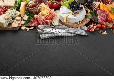 Appetizers Table. Cheese, Fuits And Meat Board