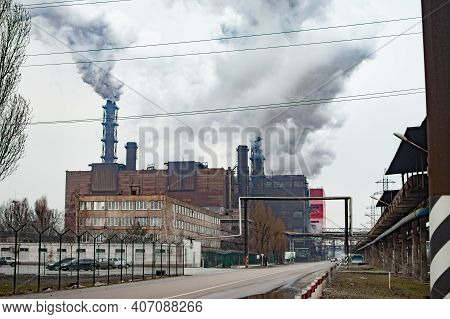 Ecology Pollution. Industry Metallurgical Plant Smoke From Pipes Mining.