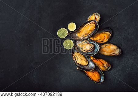 Large Mussels On A Black Background. Top View With Space For Text. Many.
