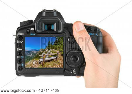 Hand with camera and River Tara canyon - Montenegro image (my photo) isolated on white background