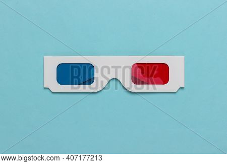 Stereoscopic Anaglyph Disposable Paper 3d Glasses On Blue Background. Top View
