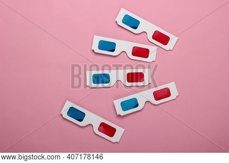 Many Stereoscopic Anaglyph Disposable Paper 3d Glasses On Pink Pastel Background. Top View